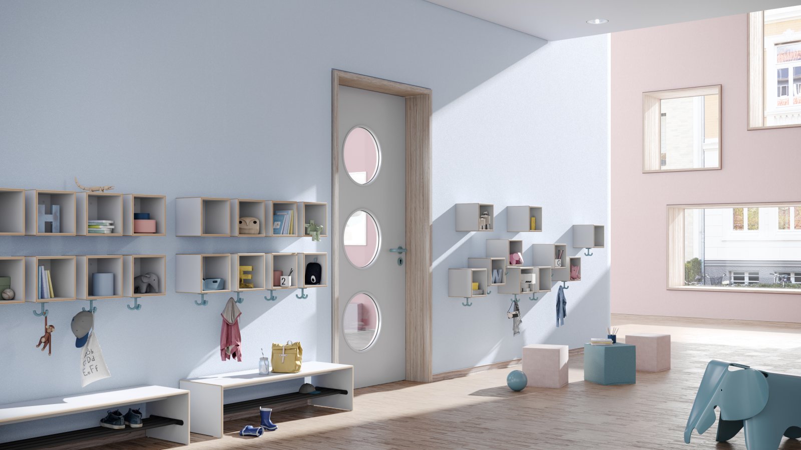 Blue kindergarten hallway with wall-mounted coat racks, triple hooks and seating